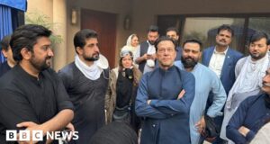 Imran Khan greets supporters after police withdraw from around ex-PM’s home