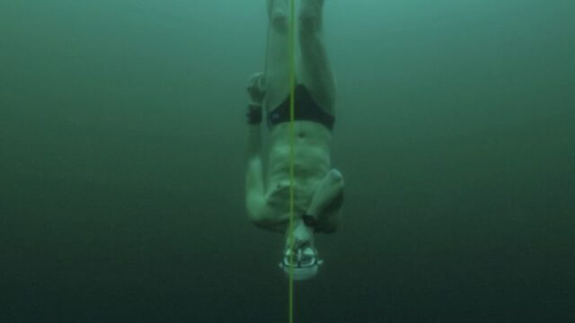 Free-diver plunges to record depth beneath frozen Swiss lake