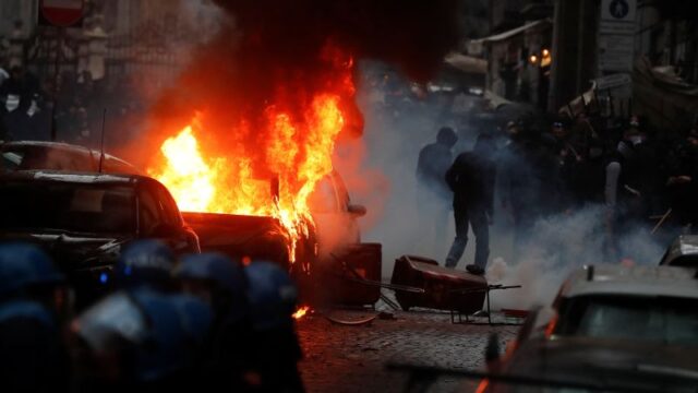 Eight arrested and 470 fans kicked out of Italy after football fan violence in Naples