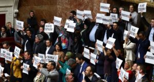 Protests erupt as French government forces through higher retirement age