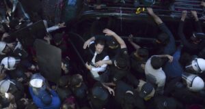 Imran Khan marks court presence as former Pakistan leader’s supporters clash with police