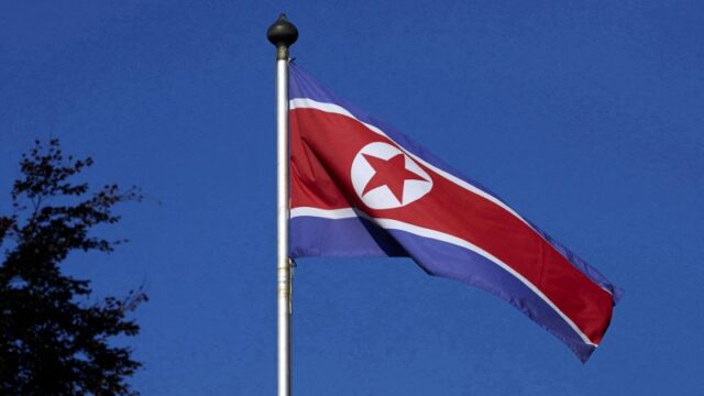 230318235434-01-north-korea-flag-100214-file.jpg