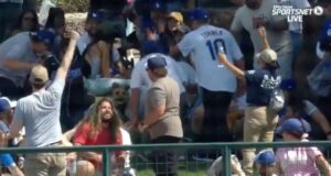A dog steals the show after catching home run ball during spring training game