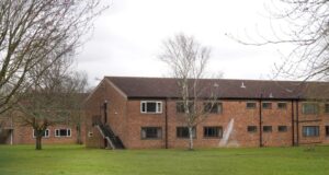 UK plan to house migrants in barracks and barges is condemned as ‘cruel’ and unworkable