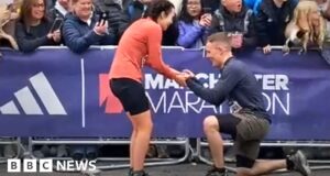 Marathon runners get engaged at finish line