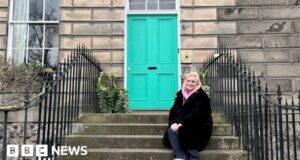 Edinburgh pink door woman sad after being forced to repaint