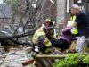 At least 22 killed and dozens hospitalized after violent storms and large tornadoes tore through the South and Midwest
