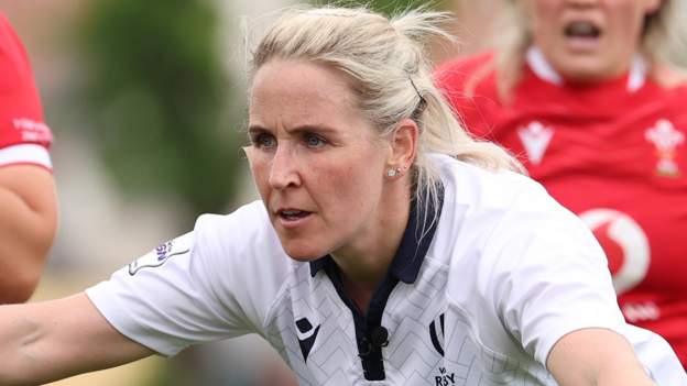 Neville first female official at men’s World Cup